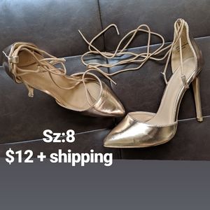 Gold tie up stilettos